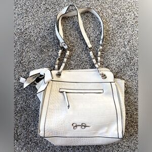 Jessica Simpson brand. Medium size purse. White color.